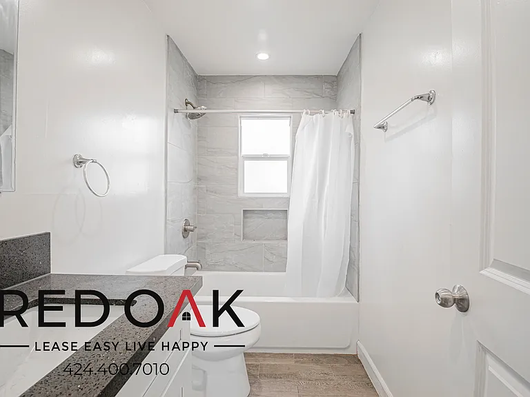 923 W 75th St #927-3/4 — Photo 9