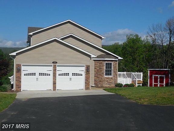 paved drive, 2 car garage