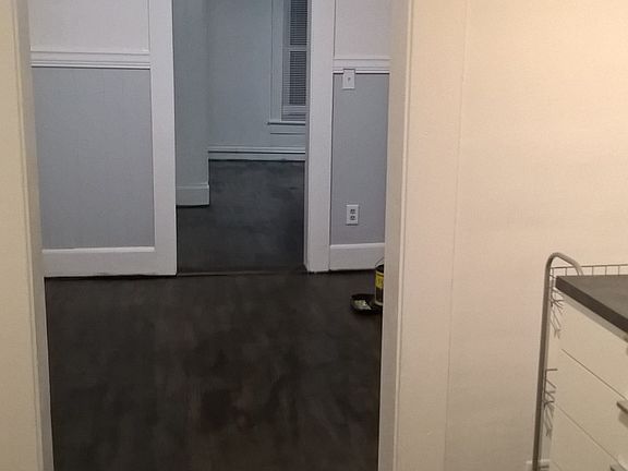 View from back door through Kitchen, bonus room and living r
