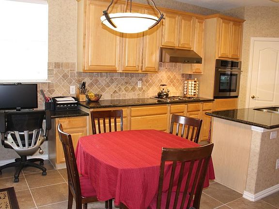Enjoy morning meals in this cozy breakfast room.