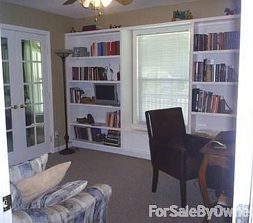 Guest Bedroom : Third Bedroom with built in bookshelves andfrench doors to second bedroom
