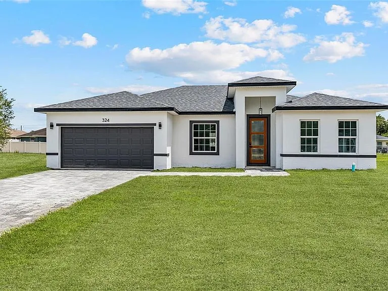 324 Marion Oaks Trl — Photo 1