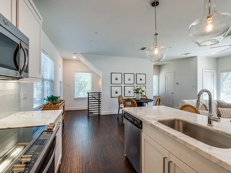 **Photos of Unit 1 to show lived in potential. Unit 5 is the same floorpan, finish outs and size.**