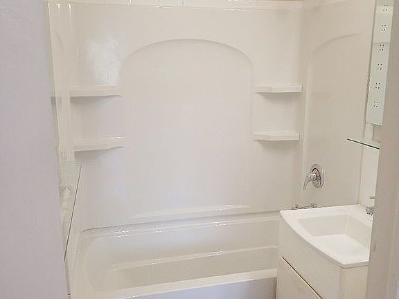 New bathroom, deep tub and shower