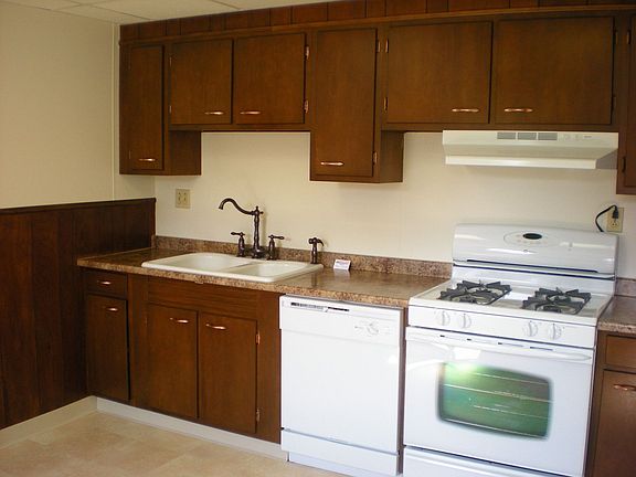 Check out the new stuff!  floor,stove,dishwasher,countertops, sink & faucet