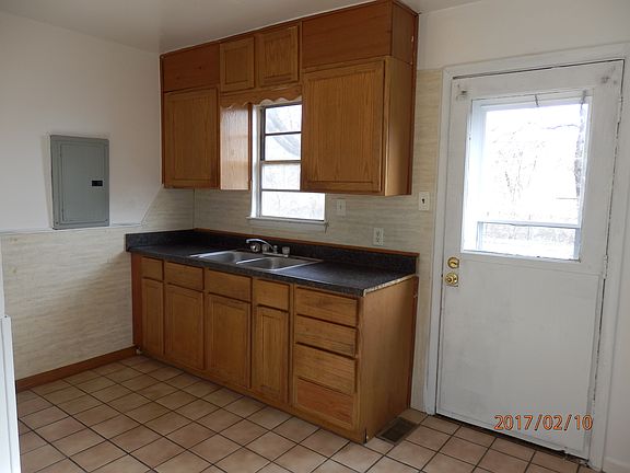 Kitchen with tiled floor