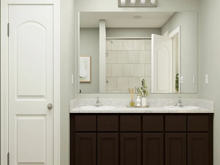 A dual sink vanity in featured in the home.