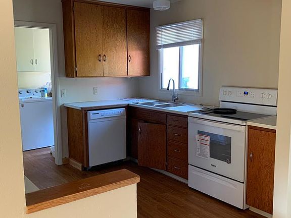 Kitchen with new floor and appliances