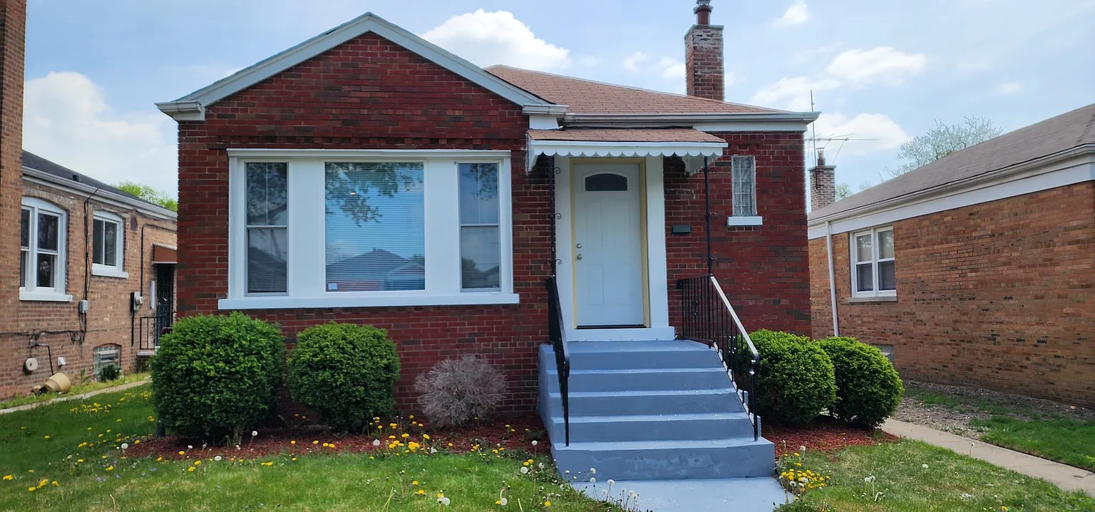 9845 S Woodlawn Ave photo 1
