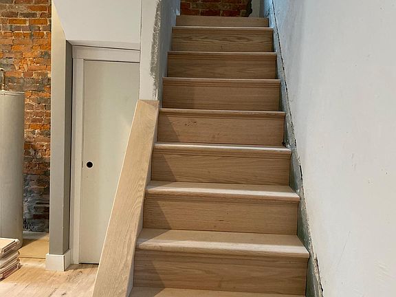 Front stairway to front upstairs bedroom/bathroom