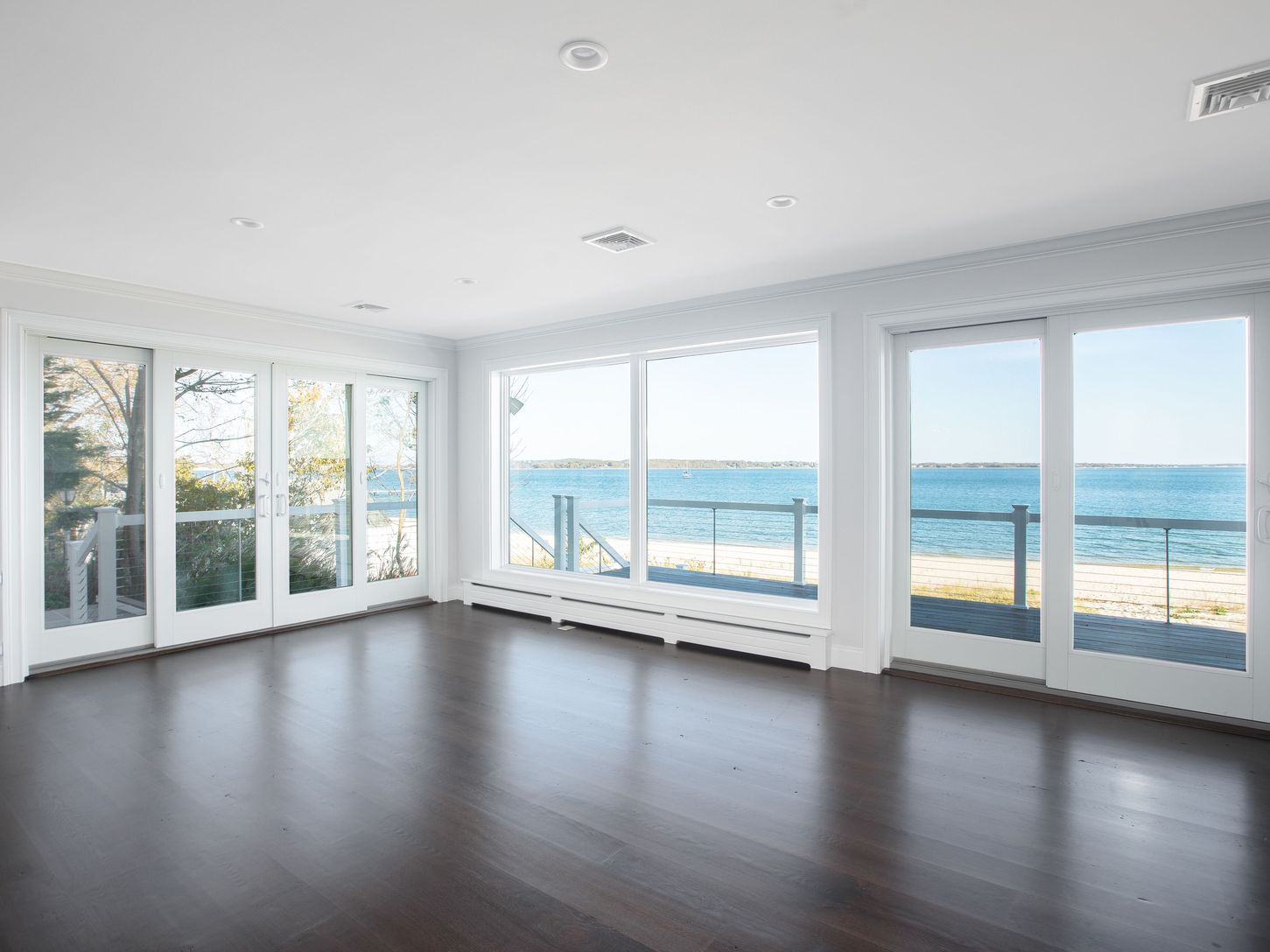  Outstanding views of sand & sea from the open kitchen/living area with gas fireplace.