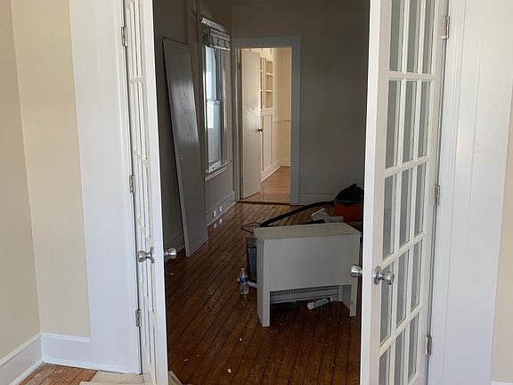 Living room facing dining room area.