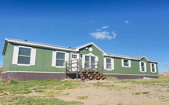 Newly painted. Long driveway and plenty space to park on-site