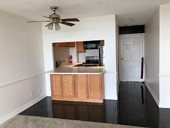 breakfast bar in living room/ceiling fan