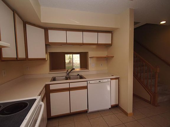 Kitchen with a view of family room and back yard