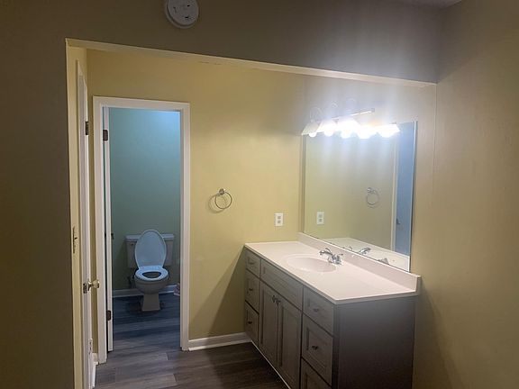 Master bedroom has 2 walk-in closets master bathroom with open dressing area