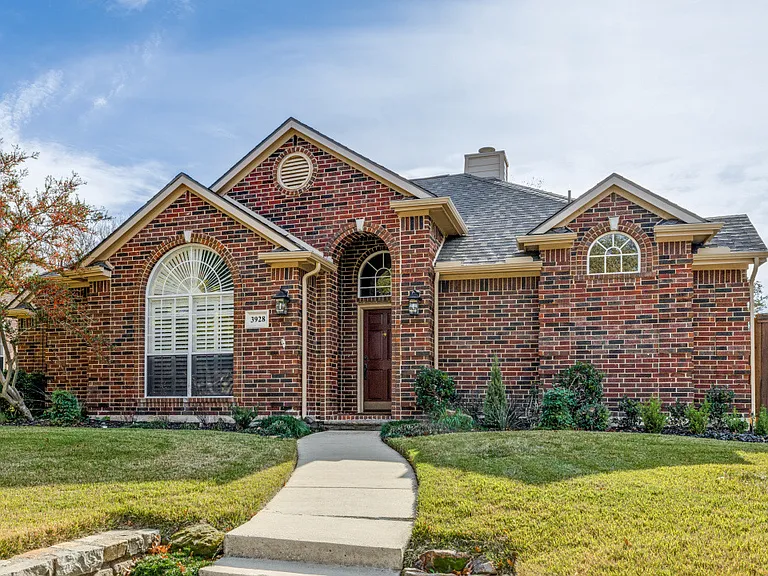 Beautiful curb appeal and landscape.