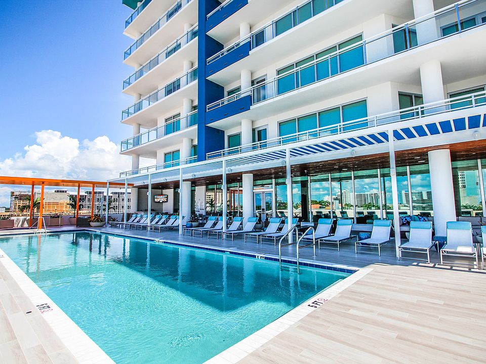 Elevated amenities deck with salt water pool and shaded spa