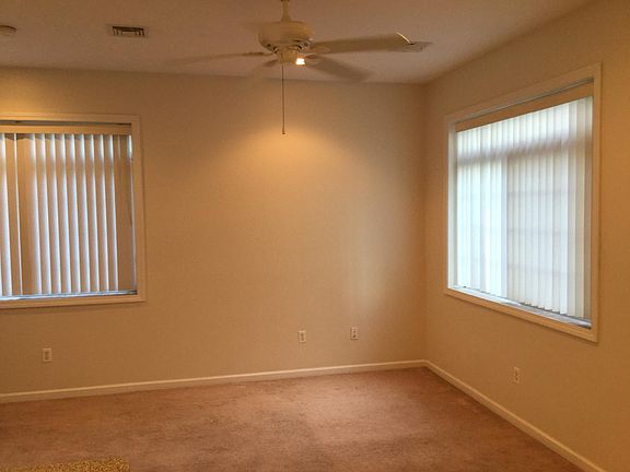 Corner apartment with large windows.