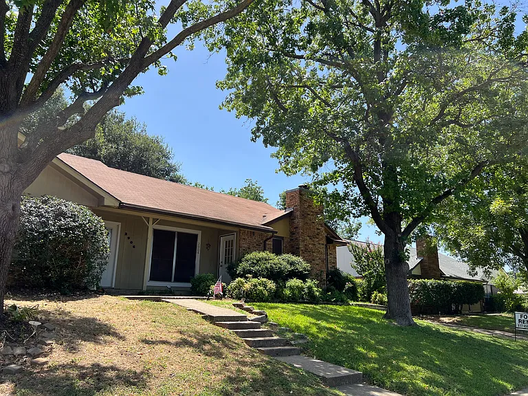 Front elevation of duplex on Kathleen Lane in Euless