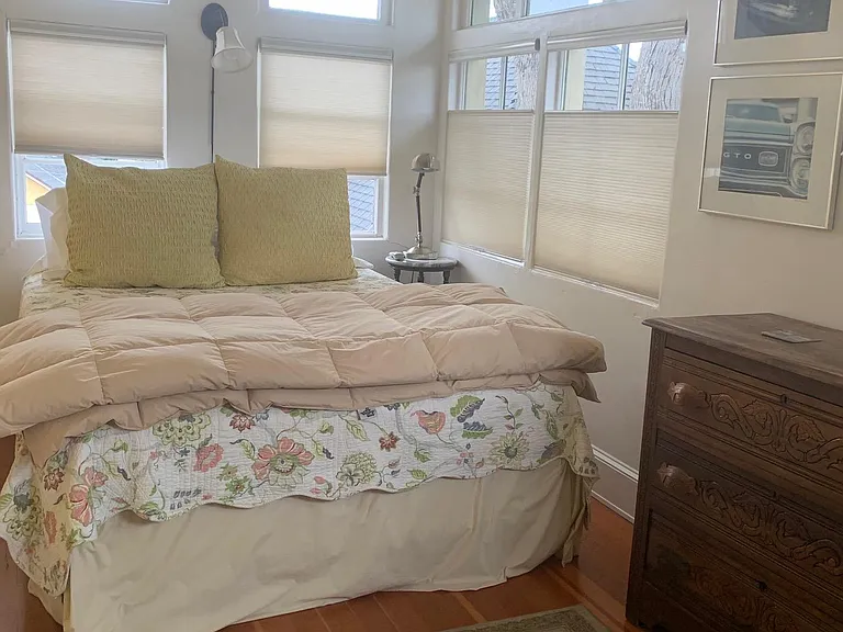Second floor bedroom with a Queen side bed