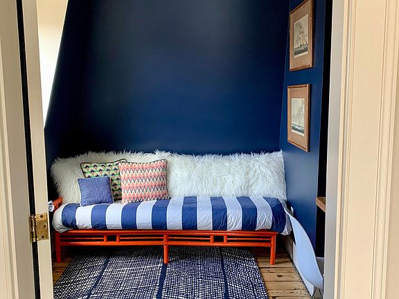 Office nook with desk and daybed.