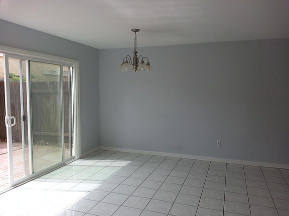 Large Dining Area With Sliders to Private Patio