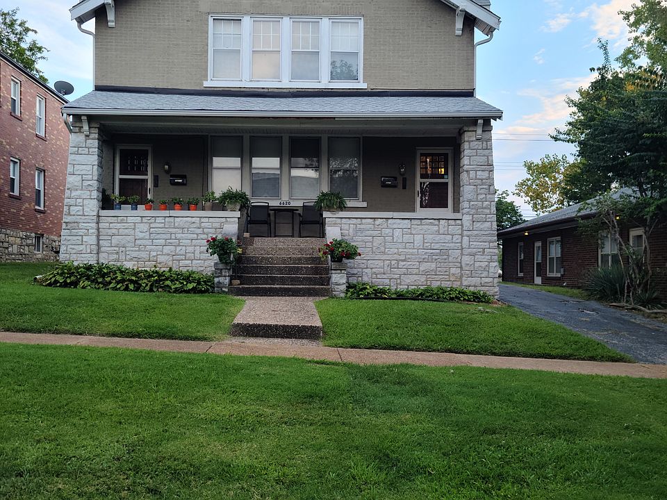 Front of duplex. First floor unit has private door entrance to the right and a nice front portch to sit on.