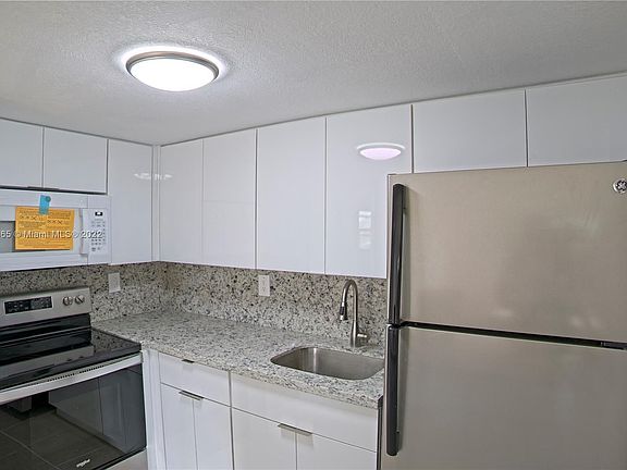 2nd image of 4265 NW South Tamiami Canal Dr #1-311