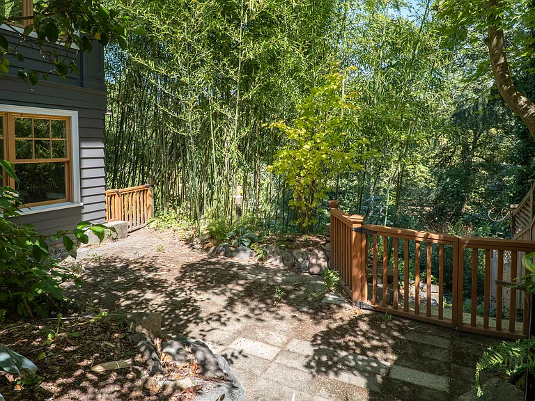 Back patio overlooking terraced back yard and Mount Baker Park.
