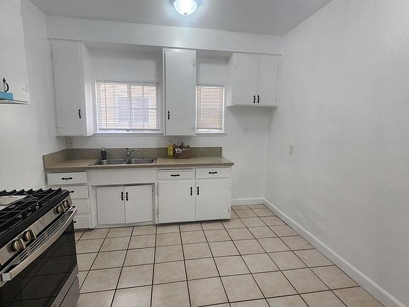 Walk in closet in hallway