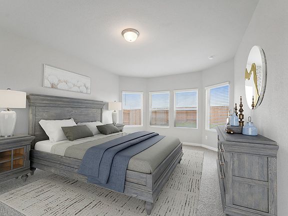 Primary bed of 6402 Buffalo Bend Ln at Wall Street Village, a Meritage Homes community in Richmond.