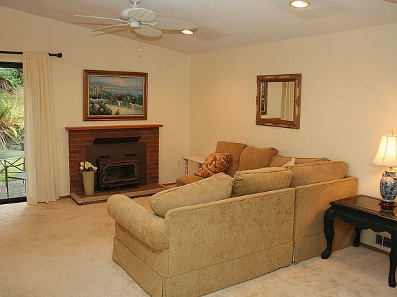 Spacious living room with skylights