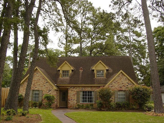 This beautifully updated home is nestled among the trees.
