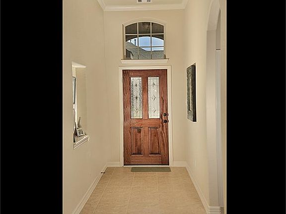 3rd image of 27 S Whistling Swan Pl