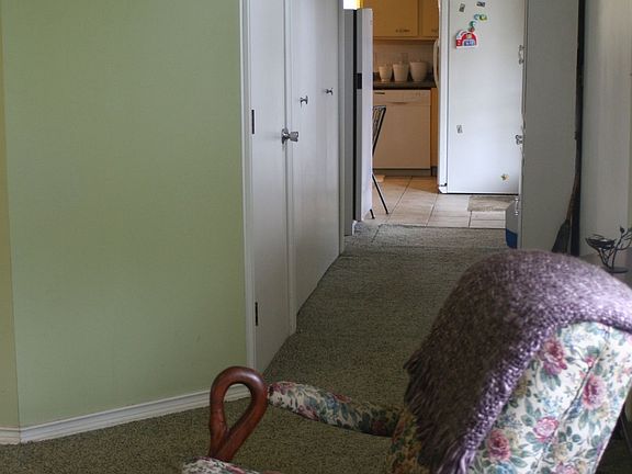 back hall looking into kitchen 