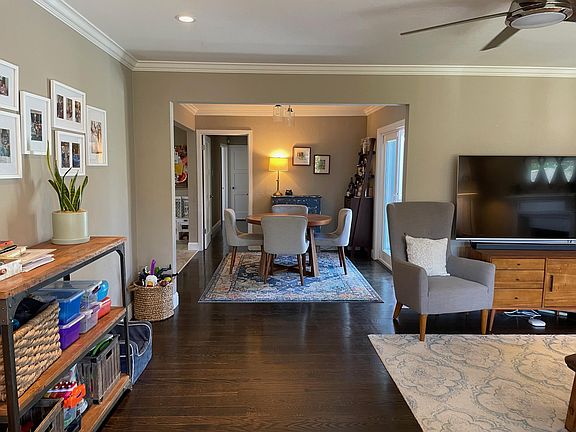 Living room opens into dining room