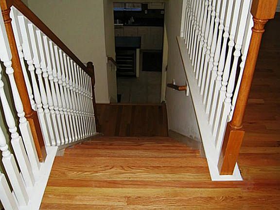 Beautiful hardwood floors on dual stairways