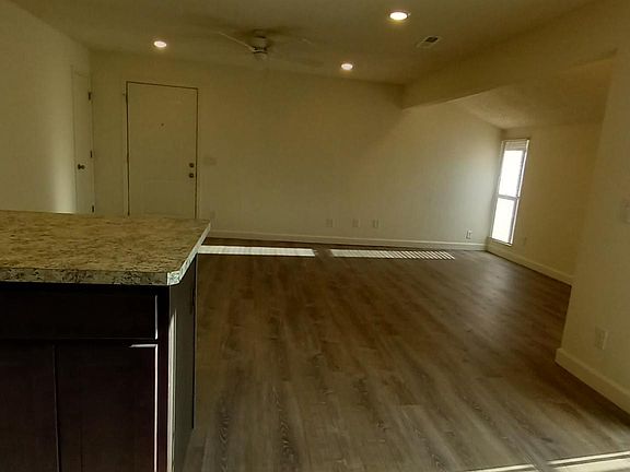 Large open floor plan living-dining area.