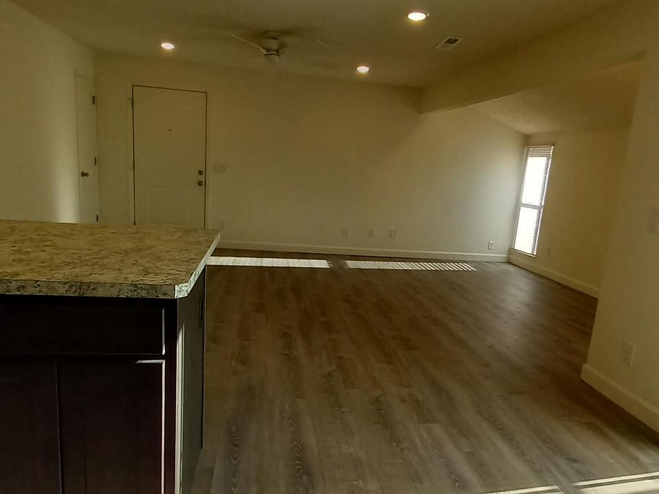 Large open floor plan living-dining area.