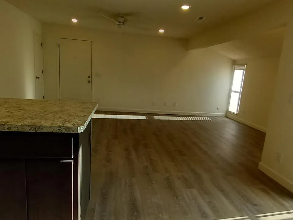 Large open floor plan living-dining area.