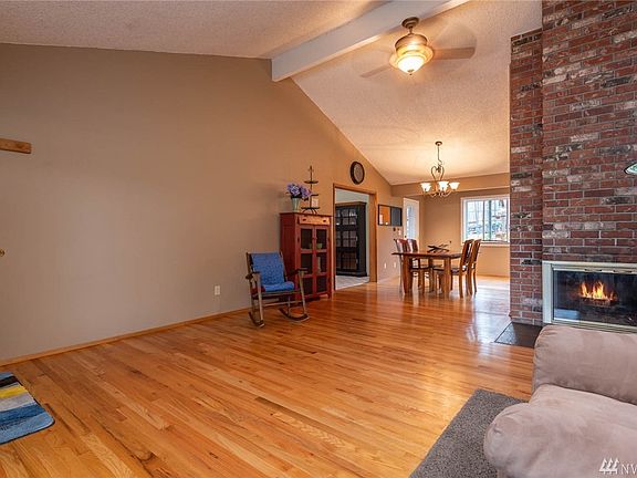 Real Hardwood floors.  Home comes with a FREE home warranty.  Gas log fireplace for those chilly winter nights.