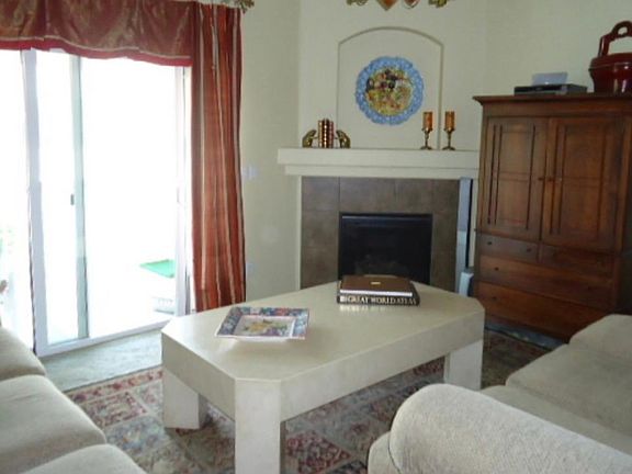 vaulted ceilings throughout and gas fireplace with easy access to patio