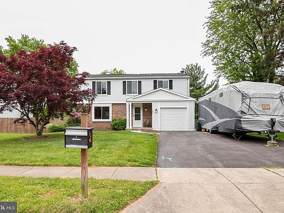 Exterior Front- Wide driveway