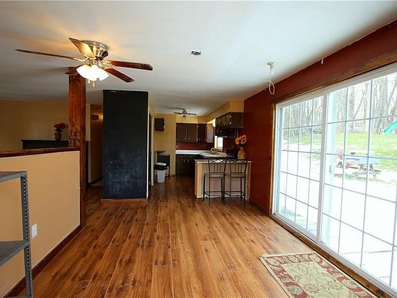 Open 13x11 Dining Room boasting Oversized Sliding Glass Doors to Amazing Backyard!