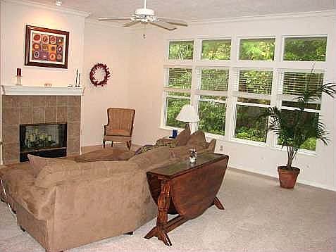 Spacious open and bright family room that overlooks the courtyard