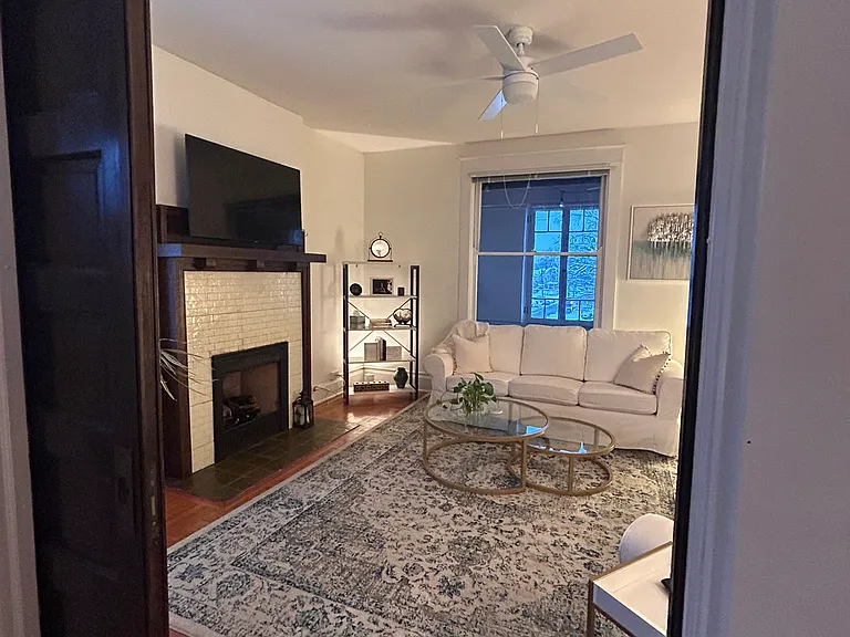 Living room through pocket doors in dining