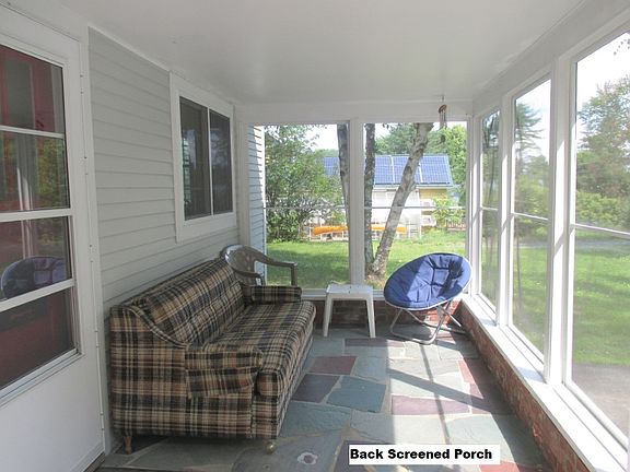 Back porch, door to left enters into kitchen