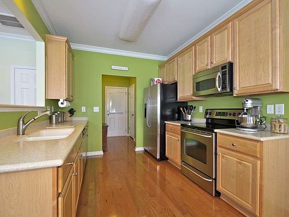 The kitchen is bright & functional; with plenty of counter space