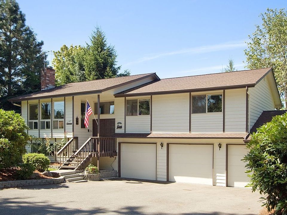 3-car garage + shop!